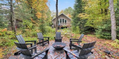 Waterfront cottage in Muskoka in September, photographed during fall showing season