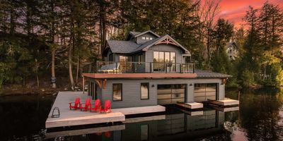 Muskoka modern boathouse with dock 