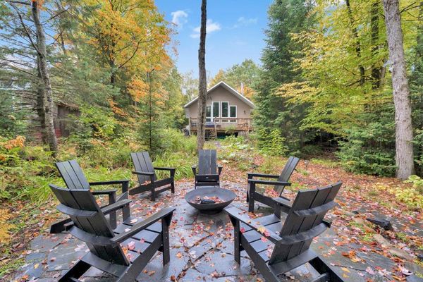 Waterfront cottage in Muskoka in September, photographed during fall showing season