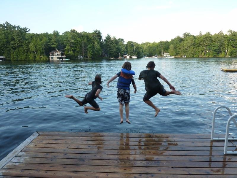  Family enjoying cottage dock on Lake Joseph